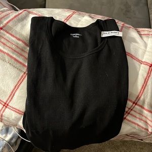Black long sleeve never worn.